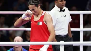 epa11522745 Imane Khelif of Algeria (red) celebrates winning over Anna Luca Hamori of Hungary (blue) in their Women 66kg Quarterfinal bout of the Boxing competitions in the Paris 2024 Olympic Games, at the North Paris Arena in Villepinte, France, 03 August 2024.  EPA/ALI HAIDER