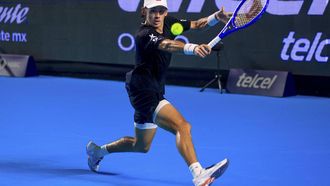 epa12772512 Alex de Minaur of Australia returns a ball against Patrick Kypson of the USA in a match at the 2026 Mexican Open in Acapulco, Mexico, 23 February 2026.  EPA/David Guzman