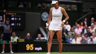 Britain's Emma Raducanu reacts during her match against New Zealand's Lulu Sun during their women's singles fourth round tennis match on the seventh day of the 2024 Wimbledon Championships at The All England Lawn Tennis and Croquet Club in Wimbledon, southwest London, on July 7, 2024. Sun won the match 6-2, 5-7, 6-2.
HENRY NICHOLLS / AFP