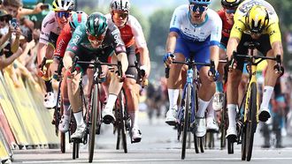 2023-06-06 17:03:34 Yellow jersey of Overall Leader Jumbo-Visma's French rider Christophe Laporte (R) sprints next to third placed Team Jayco AlUla's Dutch Dylan Groenewegen (2ndR) and second placed BORA - hansgrohe's Irish rider Sam Bennett (L), as he crosses the finish line to win the third stage of the 75th edition of the Criterium du Dauphine cycling race, 194,5 kms between Monistrol-Sur-Loire and Le Coteau, central-eastern France, on June 6, 2023. 
Anne-Christine POUJOULAT / AFP