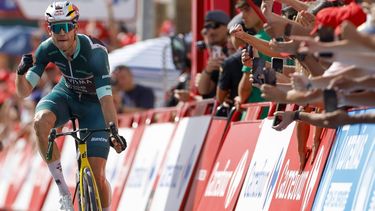 epa13211860 Belgian rider Wout Van Aert of Visma Lease a Bike team celebrates winning the 13th stage of La Vuelta a Espana cycling tour in Loja in the province of Granada, southern Spain, 04 September 2026. The stage between Almunecar and Loja covers 192 km.  EPA/Javier Lizon