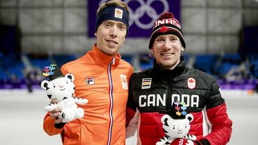 GANGNEUNG - Jorrit Bergsma (L), zilver, en Ted-Jan Bloemen, goud, in de Gangneung Oval tijdens de 10000 meter op de Olympische Winterspelen van Pyeongchang. ANP JERRY LAMPEN