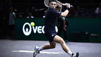 2023-11-02 21:09:45 Netherlands' Tallon Griekspoor plays a backhand return to Serbia's Novak Djokovic during their men's singles match on day four of the Paris ATP Masters 1000 tennis tournament at the Accor Arena - Palais Omnisports de Paris-Bercy - in Paris on November 2, 2023. 
JULIEN DE ROSA / AFP