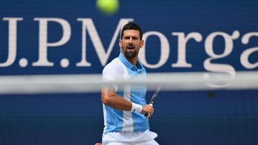 2023-08-30 21:00:50 Serbia's Novak Djokovic hits a return to Spain's Bernabe Zapata Miralles during the US Open tennis tournament men's singles second round match at the USTA Billie Jean King National Tennis Center in New York City, on August 30, 2023. 
ANGELA WEISS / AFP