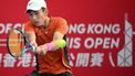 China’s Shang Juncheng hits a return to USA’s Frances Tiafoe during their men's quarter-final singles tennis match at the Hong Kong Open in Hong Kong on January 5, 2024. 
Peter PARKS / AFP