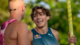 Sweden's Armand Duplantis (R) reacts with US' Sam Kendricks during the men's pole vault city event part of the 