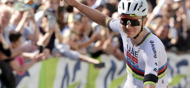 epa12915106 Slovenian rider Tadej Pogacar of team UAE Team Emirates XRG celebrates winning the Liege Bastogne Liege one-day cycling race over 259.5km from Liege to Liege, Belgium, 26 April 2026.  EPA/OLIVIER MATTHYS