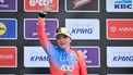 Third-placed Italian Chiara Consonni of Lidl-Trek gestures on the podium after the Cycling World Tour Gent-Wevelgem women's 171,2 km from Ieper to Wevelgem, on March 24, 2024. 
ERIC LALMAND / Belga / AFP