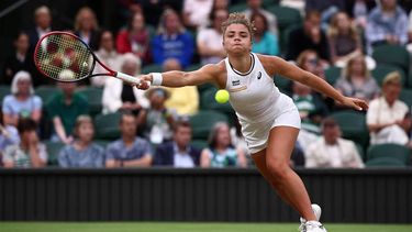 Italy's Jasmine Paolini returns against USA's Emma Navarro during their women's singles quarter-finals tennis match on the ninth day of the 2024 Wimbledon Championships at The All England Lawn Tennis and Croquet Club in Wimbledon, southwest London, on July 9, 2024. 
HENRY NICHOLLS / AFP