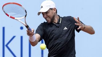 2023-07-19 11:13:59 epa10755304 Dominic Thiem of Austria in action against Hamad Medjedovic of Serbia at the Swiss Open tennis tournament in Gstaad, Switzerland, 19 July 2023.  EPA/PETER SCHNEIDER