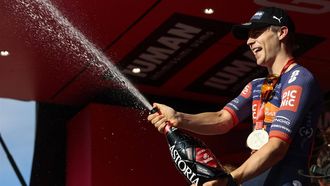 Team Picnic PostNL's Dutch rider Casper Van Uden celebrates on the podium after winning the 4th stage of the 108th Giro d'Italia cycling race 189kms from Alberobello to Lecce on May 13, 2025. 
Luca Bettini / AFP