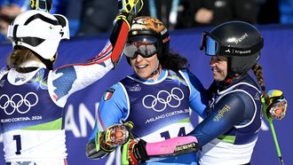 epa12742767 Winner Federica Brignone (C) of Italy is congratulated by second placed Sara Hector (R) of Sweden and third placed Thea Louise Stjernesund of Norway after the 2nd run in the Women's Giant Slalom of the Alpine Skiing competitions at the Milano Cortina 2026 Winter Olympic Games, Tofane ski centre in Cortina d'Ampezzo, Italy, 15 February 2026.  EPA/DANIEL DAL ZENNARO