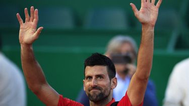 Serbia's Novak Djokovic gestures to the public as he leaves the court at the end of his Monte Carlo ATP Masters Series Tournament semi final tennis match against Norway's Casper Ruud on the Rainier III court at the Monte Carlo Country Club on April 13, 2024. 
Valery HACHE / AFP