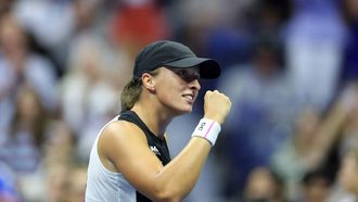 Poland's Iga Swiatek celebrates her victory over Russia's Anna Kalinskaya during their women's singles third round match on day seven of the US Open tennis tournament at the USTA Billie Jean King National Tennis Center in New York City, on August 30, 2025. 
CHARLY TRIBALLEAU / AFP