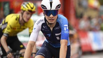 Team Israel Premier Tech 's US rider Matthew Riccitello crosses the finish line during the 14th stage of the Vuelta a Espana cycling tour, a 135 km race between Aviles and La Farrapona in Somiedo, on September 6, 2025.   Cycling team Israel-Premier Tech removed their name from their kit at the Vuelta a Espana today after pro-Palestine protests aimed at them during the race.
Miguel RIOPA / AFP