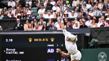 Britain's Sonay Kartal serves to Russia's Anastasia Pavlyuchenkova during their women's singles fourth round tennis match on the seventh day of the 2025 Wimbledon Championships at The All England Lawn Tennis and Croquet Club in Wimbledon, southwest London, on July 6, 2025. 
Kirill KUDRYAVTSEV / AFP