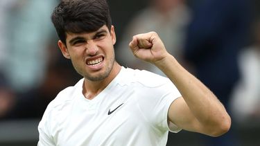 epa11459865 Carlos Alcaraz of Spain celebrates after winning the Men's 3rd round match against Frances Tiafoe of the USA at the Wimbledon Championships, Wimbledon, Britain, 05 July 2024. Alcaraz won in five sets.  EPA/ADAM VAUGHAN  EDITORIAL USE ONLY