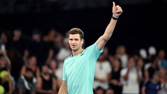 epa11079042 Hubert Hurkacz of Poland reacts after winning his first round match against Omar Jasika of Australia on Day 2 of the 2024 Australian Open at Melbourne Park in Melbourne, Australia, 15 January 2024.  EPA/JAMES ROSS  AUSTRALIA AND NEW ZEALAND OUT