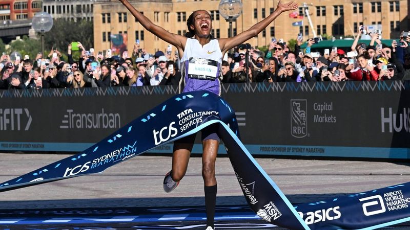 Netherlands's Sifan Hassan crosses the finish line first in the 2025 Sydney Marathon, crossing the iconic Harbour Bridge on August 31, 2025. 
Saeed KHAN / AFP