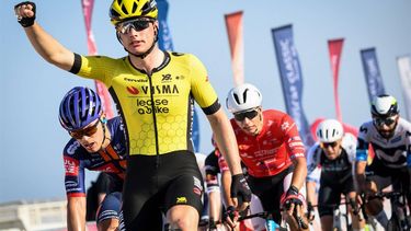 Visma-Lease a Bike team's Netherland rider Olav Kooij celebrates after crossing the finish line to win the first stage of the Tour of Oman cycling race from Bushar to Bimmah Sinkhole, eastern Muscat Governorate, on February 8, 2025. 
Loic VENANCE / AFP
