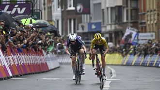 Fenix-Deceuninck team 's Dutch rider Puck Pieterse (L) crosses the finish line to win followed by Team SD Worx - Protime's Dutch rider Demi Vollering (R) during the 4th stage (out of 8) of the third edition of the Women's Tour de France cycling race, a 122.7 km between Valkenburg and Liege, on August 14, 2024. 
JULIEN DE ROSA / AFP