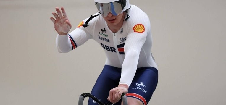Great Britain's  #121 Matthew Richardson celebrates winning silver in the men's sprint final at the 2025 UCI Track World Championships, in the Penalolen Velodrome in Santiago, on October 26, 2025. 
Javier TORRES / AFP
