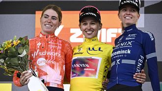 (From L) Stage winner and second placed Team SD Worx - Protime's Dutch rider Demi Vollering, Overalll leader and first placed Canyon//SRAM Racing team's Polish rider Katarzyna Niewiadoma wearing the overall leader's yellow jersey and third placed Fenix-Deceuninck team's Dutch rider Pauliena Rooijakkers celebrate on the podium after competing in the 8th and last stage of the third edition of the Women's Tour de France cycling race, a 149.9 km between Le Grand Bornand and the Alpe d'Huez, in L'Alpe d'Huez, south-eastern France, on August 18, 2024. 
JULIEN DE ROSA / AFP