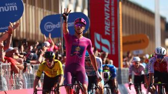 Best sprinter's cyclamen jersey Team Lidl-Trek's Italian rider Jonathan Milan celebrates as he crosses the finish line to win the 13th stage of the 107th Giro d'Italia cycling race, 179km between Riccione and Cento, on May 17, 2024.  
Luca Bettini / AFP