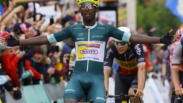 epa11462483 Eritrean rider Biniam Girmay of Intermarche-Wanty celebrates as he crosses the finish line to win the eighth stage of the 2024 Tour de France cycling race over 183km from Semur-en-Auxois to Colombey-les-Deux-Eglises, France, 06 July 2024.  EPA/KIM LUDBROOK