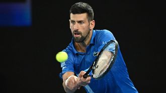 epa11835778 Novak Djokovic of Serbia plays a shot during the Men's Singles round four match against Jiri Lehecka of the Czech Republic at the Australian Open tennis tournament in Melbourne, Australia, 19 January 2025.  EPA/JAMES ROSS AUSTRALIA AND NEW ZEALAND OUT