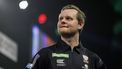 epa11031761 Kevin Doets of The Netherlands reacts after losing against Michael Smith of England (not pictured) during the opening session of the Paddy Power World Darts Championship at Alexandra Palace in London, Britain, 15 December 2023.  EPA/TOLGA AKMEN