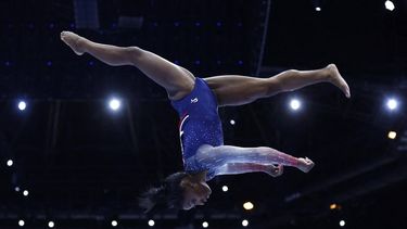 2023-10-04 21:01:55 US' Simone Biles competes on the Balance Beam in the Women's Team Final during the 52nd FIG Artistic Gymnastics World Championships, in Antwerp, northern Belgium, on October 4, 2023. 
KENZO TRIBOUILLARD / AFP