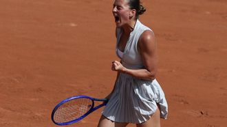 Ukraine's Marta Kostyuk reacts after a point as she plays against Oksana Selekhmeteva during their women's singles match on day 1 of the French Open tennis tournament on Court Simonne-Mathieu at the Roland-Garros Complex in Paris on May 24, 2026. 
ALAIN JOCARD / AFP