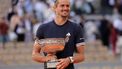 epa13022866 Alexander Zverev of Germany celebrates with the Coup de Mousquetaire trophy after winning his Men's final match against Flavio Cobolli of Italy at the French Open Grand Slam tennis tournament at Roland Garros in Paris, France, 07 June 2026.  EPA/TERESA SUAREZ