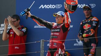 Team Ducati Lenovo Team's Marc Marquez celebrates on the podium after winning the MotoGP race of the Aragon MotoGP Grand Prix at the Motorland circuit in Alcaniz, northeastern Spain, on August 30, 2026. 
JOSE JORDAN / AFP