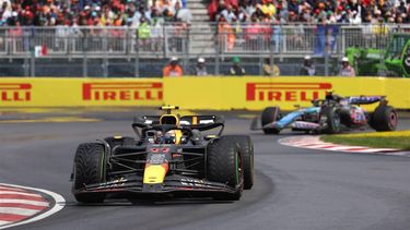 Red Bull Racing's Mexican driver Sergio Perez races ahead of Alpine's French driver Pierre Gasly during the 2024 Canada Formula One Grand Prix at Circuit Gilles-Villeneuve in Montreal, Canada, on June 9, 2024.  
CHARLY TRIBALLEAU / AFP