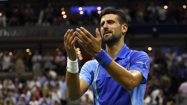 2023-09-11 02:37:07 Serbia's Novak Djokovic reacts after defeating Russia's Daniil Medvedev during the US Open tennis tournament men's singles final match at the USTA Billie Jean King National Tennis Center in New York City, on September 10, 2023. 
kena betancur / AFP