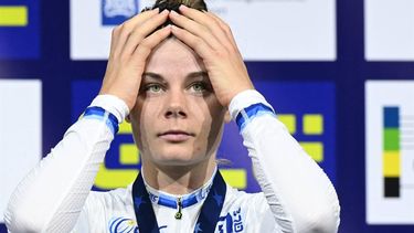 First placed Belgium's Lotte Kopecky celebrates on the podium for the Women's Elimination race during the fourth day of the UEC European Track Cycling Championships at the Omnisport indoor arena in Apeldoorn, on January 13, 2024. 
JOHN THYS / AFP