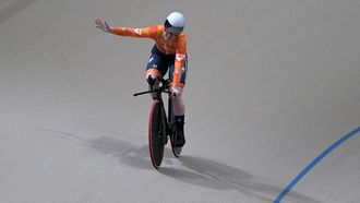 Netherlands' #122 Hetty Van de Wouw celebrates after setting a new world record and winning the women's 1km time trial event final at the 2025 UCI Track World Championships, in the Penalolen Velodrome in Santiago, on October 25, 2025. 
Rodrigo ARANGUA / AFP