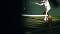 Netherlands' Botic Van De Zandschulp returns the ball to Italy's Matteo Arnaldi during their men's singles first round tennis match on the first day of the 2025 Wimbledon Championships at The All England Lawn Tennis and Croquet Club in Wimbledon, southwest London, on June 30, 2025. 
Kirill KUDRYAVTSEV / AFP