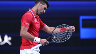 epa11054643 Novak Djokovic of Serbia reacts during his match against Alex De Minaur of Australia during their quarterfinal match of the 2024 United Cup at RAC Arena in Perth, Australia, 03 January 2024.  EPA/RICHARD WAINWRIGHT  AUSTRALIA AND NEW ZEALAND OUT