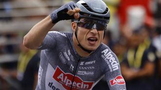 epa11474368 Belgian rider Jasper Philipsen of Alpecin - Deceuninck celebrates after he crosses the finish line and winning the 13th stage of the 2024 Tour de France cycling race over 165km from Agen to Pau, France, 12 July 2024.  EPA/KIM LUDBROOK