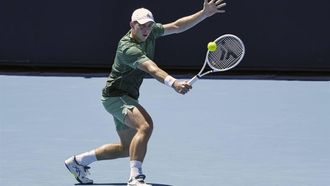 epa11822899 Tallon Griekspoor of the Netherlands in action against Hubert Hurkacz of Poland during their Men's first round match during the Australian Open tennis tournament in Melbourne, Australia, 14 January 2025.  EPA/ROLEX DELA PENA