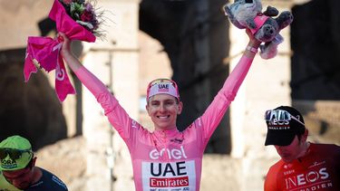 epa11372530 First-placed Tadej Pogacar of Uae Team EmiratesÂ poses on the podium after the Giro d'Italia 2024 cycling tour, in Rome, Italy, 26 May 2024.  EPA/GIUSEPPE LAMI