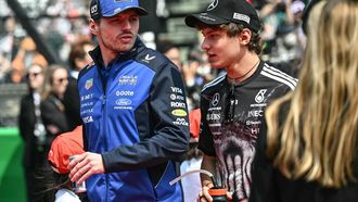 Red Bull Racing's Dutch driver Max Verstappen and Mercedes' Italian driver Kimi Antonelli arrive for the drivers' parade before the Formula One Japanese Grand Prix at the Suzuka circuit in Suzuka, Mie prefecture on March 29, 2026. 
Philip FONG / AFP