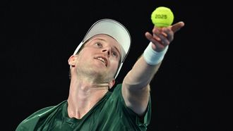 epa11823599 Botic Van de Zandschulp of the Netherlands in action during the Men's Singles first round match against Alex De Minaur of Australia at the Australian Open Grand Slam tennis tournament in Melbourne, Australia, 14 January 2025.  EPA/JOEL CARRETT  AUSTRALIA AND NEW ZEALAND OUT