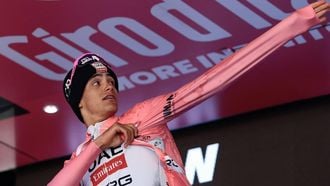 UAE Team Emirates XRG's Mexican rider Isaac Del Toro puts on the pink jersey of overall leader (Maglia Rosa) as he celebrates on the podium after placed second in the 19th stage of the 108th Giro d'Italia cycling race of 166kms from Biella to Champoluc on May 30, 2025. 
Luca Bettini / AFP