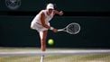 Poland's Iga Swiatek serves to US player Amanda Anisimova during their women's singles final tennis match on the thirteenth day of the 2025 Wimbledon Championships at The All England Lawn Tennis and Croquet Club in Wimbledon, southwest London, on July 12, 2025. 
HENRY NICHOLLS / AFP