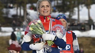 epa09819123 Norway's Therese Johaug, winner, on the podium of the womans Interval start 10.0 km Free style of the FIS Nordic Skiing World Cup in Falun, Sweden, 12  March 2022.  EPA/ULF PALM  SWEDEN OUT