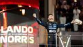 ABU DHABI - Lando Norris (McLaren) viert zijn wereldtitel op het podium van het Yas Marina Circuit na afloop van de Abu Dhabi Grand Prix. ANP SANDER KONING